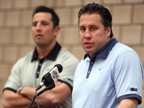 Spits GM Warren Rychel, right, and coach Bob Boughner answer questions from season ticket holders at the WFCU Centre last year. (TYLER BROWNBRIDGE/The Windsor Star)