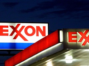 Emergency crews sent by U.S. oil giant Exxon Mobile worked March 31 to contain several thousand gallons of crude oil that spilled from a ruptured company pipeline in central Arkansas, the corporation said. (KAREN BLEIER/AFP/Getty Images)