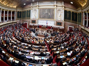 French members of Parliament take part in a vote to adopt a bill legalising same-sex marriages and adoptions for gay couples, on April 23, 2013 in Paris. (MARTIN BUREAU/AFP/Getty Images)