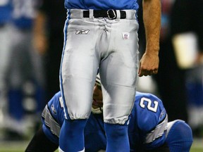 Detroit kicker Jason Hanson watches his game-winning field goal against the Minnesota Vikings during overtime at Ford Field in 2006. (Photo by Harry How/Getty Images)