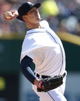 Detroit's Drew Smyly throws a pitch in the eighth inning against the New York Yankees in the home opener at Comerica Park Friday. (Photo by Leon Halip/Getty Images)