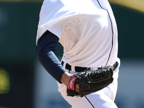 Detroit's Drew Smyly throws a pitch in the eighth inning against the New York Yankees in the home opener at Comerica Park Friday. (Photo by Leon Halip/Getty Images)