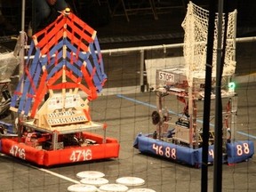 Assumption College Catholic High School's robot (also known as the "Terrible Peacock") dukes it out with a competitor at the FIRST robotics regional competition in Mississauga this past weekend. (Photo: Courtesy WEtech Alliance)