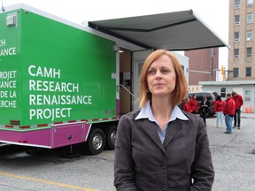 Dr. Samantha Wells, a principal investigator stands next to a   CAMH mobile research lab in downtown Windsor, Ontario on May 1, 2012.   See story by Chris Thompson on research on bar-goers.  (JASON KRYK/ The Windsor Star)