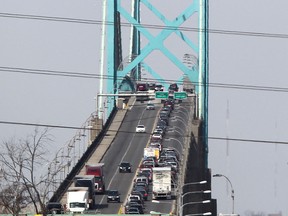 Cars are backed up to the Canadian entrance on the Ambassador Bridge.  (DAX MELMER/The Windsor Star)