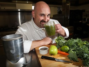 Chef Ahron Goldman dives into his mega-healthy juice drink. (NICK BRANCACCIO / The Windsor Star)