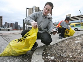 Chris Dahmann (L) and Steve Resendes (R) are shown volunteering for the City of Windsor's 2008 Clean Sweep  campaign in this file image. (Scott Webster / The Windsor Star)