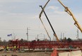 A large scale concrete pour takes place on Monday during construction of the Herb Gray Parkway in Windsor, Ontario on April 15, 2013 in Windsor, Ontario. The Parkway is the access road portion of a new proposed end-to-end border transportation system at Canada's busiest land border crossing and premier trade corridor.  (JASON KRYK/The Windsor Star)