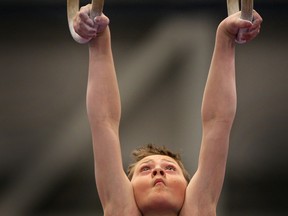 Mason Evers, from the National Capital Boys Gymnastics Academy, competes on the rings at the Ontario Gymnastics Championships at the St. Denis Centre, Saturday, April 6, 2013.  (DAX MELMER/The Windsor Star)
