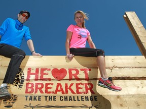 Jason Petro, left, organizer for the Heart Breaker Challenge, and Windsor Star reporter Kelly Steele are pictured on a wall to be included in the Heart Breaker Challenge at Malden Park. (DAX MELMER / The Windsor Star)