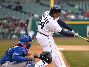 Miguel Cabrera of the Detroit Tigers singles to left field during the first inning of the game  against the Toronto Blue Jays at Comerica Park on April 10, 2013 in Detroit. (Leon Halip/Getty Images)