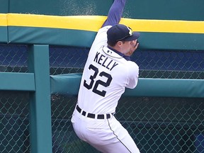 Don Kelly of the Detroit Tigers makes a catch against the fence on the fly ball to left field from J.P. Arencibia of the Toronto Blue Jays at Comerica Park April 9, 2013 in Detroit, Michigan. The Tigers defeated the Blue Jays 7-3.  (Photo by Leon Halip/Getty Images)