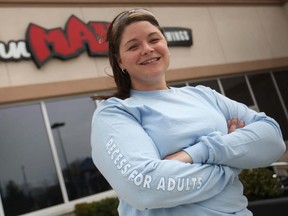 Kyla Woodcock, director of Rose City Sport and Social Club, is pictured in front of John Max Sports and Wings, the club's partner pub.  (DAX MELMER/The Windsor Star)