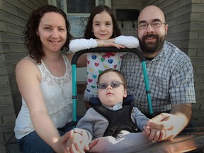Michelle, left, and Vince Laframboise with their children Rebecca, 6, and Connor, 3, at their Amherstburg home on Tuesday, April 30, 2013. (DAN JANISSE/The Windsor Star)