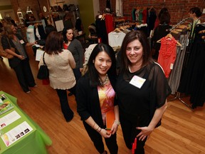 Fe Wyma, left, and Maria Locker are photographed during the kickoff of the local chapter of Mompreneurs at Bump Maternity in Windsor on Thursday. (TYLER BROWNBRIDGE / The Windsor Star)