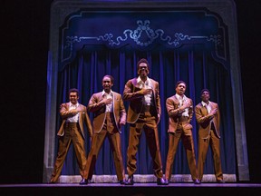 This theater image released by Boneau/Bryan-Brown shows, from left, Jesse Nager, Donald Webber, Jr., Julius Thomas III, Ephraim M. Sykes and Jawan M. Jackson portraying The Temptations in "Motown: The Musical," performing at the Lunt-Fontanne Theatre in New York. (AP Photo/Boneau/Bryan-Brown, Joan Marcus)