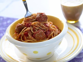 Spaghetti and meatballs is a simple yet tasty way to use ground beef beyond making burgers for the grill. (Courtesy Running Press Book)