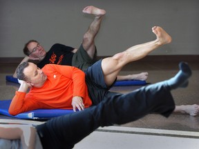 Fitness instructor Randy Borrink, centre,  conducts a Pilates class at WFCU Centre. (NICK BRANCACCIO / The Windsor Star)