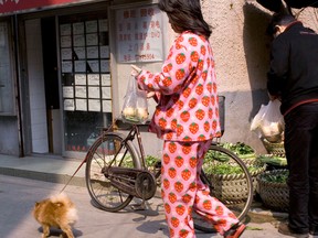People wearing their PJs in public is becoming a common sight nowadays. 
(STEVEN CURTIN / Postmnedia News files)