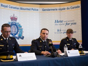 From left: Gaetan Courchesne, James Malizia and Jennifer Strachan of RCMP speak at a press conference in Toronto, Ont. on April 22, 2013. Officials revealed that two non-Canadian men have been arrested on terrorism-related charges for an alleged plot to attack VIA Rail. (Chris Young / Canadian Press)