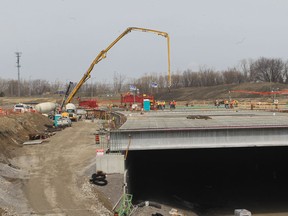 In this file photo, a large scale concrete pour takes place on Monday during construction of the Herb Gray Parkway in Windsor, Ontario on April 15, 2013 in Windsor, Ontario. (JASON KRYK/The Windsor Star)