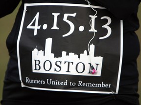 Runners sport special bibs during a 5 km run in Kingsville  on Tuesday, April 16, 2013. The run was organized as a tribute to the victims of the bombings during the Boston Marathon. (TYLER BROWNBRIDGE/The Windsor Star)