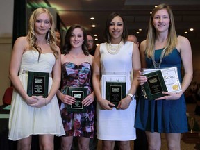 Women's basketball players Kelly Rizea, from left, Rachel Duic, Bienka Jones and Kendyl Rizea accept their awards at the St. Clair College athletic awards banquet at the St. Clair Centre for the Arts in Windsor on Thursday, April 11, 2013.                             (TYLER BROWNBRIDGE/The Windsor Star)
