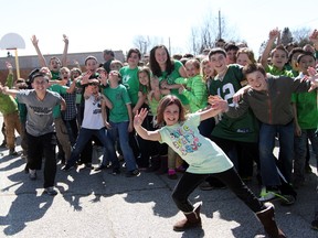 Students at St. Gabriel Catholic Elementary School came together Friday, April 5, 2013 to form a giant human tree to promote the Majesta Trees of Knowledge online voting competition. The school has made it into the top 10 in the national competition to win a $20,000 outdoor classroom. (DYLAN KRISTY/The Windsor Star)