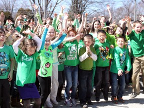 Students at St. Gabriel Catholic Elementary School came together Friday, April 5, 2013 to form a giant human tree to promote the Majesta Trees of Knowledge online voting competition. The school has made it into the top 10 in the national competition to win a $20,000 outdoor classroom. (DYLAN KRISTY/The Windsor Star)