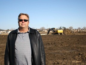 Ralph Sandstedt, owner of LaSalle-based Equinox Reality Inc., stands on the future site of Southwind Estates subdivision on Highway 3 in Leamington Wednesday, April 3, 2013. (DYLAN KRISTY/The Windsor Star)