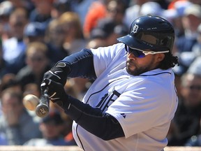 Detroit Tigers sugger Prince Fielder connects his bat with the baseball hitting one of two home runs during the MBL home opener against the New York Yankees at Comerica Park in Detroit, Michigan on April 5, 2013.  (JASON KRYK/The Windsor Star)