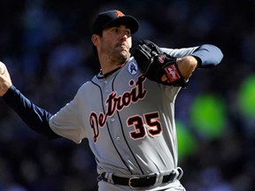 Detroit's Justin Verlander delivers a pitch against the Minnesota Twins during the Opening Day game April 1, 2013 at Target Field in Minneapolis, Minnesota. (Hannah Foslien/Getty Images)