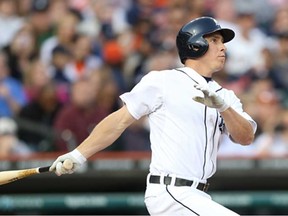 Detroit's Andy Dirks hits a solo home run to right field against the Minnesota Twins at Comerica Park April 29, 2013 in Detroit. (Leon Halip/Getty Images)