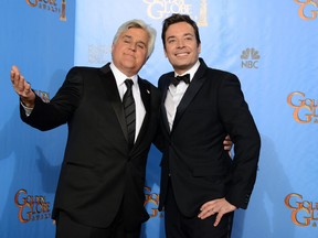 This Jan. 13, 2013 file photo shows Jay Leno, host of "The Tonight Show with Jay Leno," left, and Jimmy Fallon, host of "Late Night with Jimmy Fallon" backstage at the 70th Annual Golden Globe Awards in Beverly Hills, Calif. NBC announced Wednesday, April 3, 2013 that Jimmy Fallon is replacing Jay Leno as the host of "The Tonight Show" in spring 2014. (Photo by Jordan Strauss/Invision/AP, file)