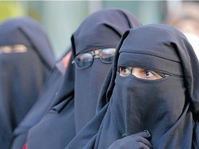 The question of whether women should be allowed to wear the niqab, or face veil, in court has been bouncing through the Canadian legal system for five years. (Associated Press files)