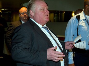 Toronto Mayor Rob Ford leaves his office on Friday May 17, 2013 at city hall in Toronto amid allegations of crack cocaine use. (Frank Gunn/The Canadian Press)