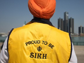 In this file photo, Taj Dhaliwal wears his 'Proud to be Sikh' vest during Khalsa Day celebrations at the Riverfront Festival Plaza in downtown Windsor, Sunday, May 19, 2013.  (DAX MELMER/The Windsor Star)