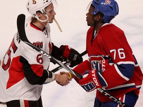 Montreal's P.K. Subban, right, shakes hands with Ottawa's Erik Karlsson following the Senators' playoff series victory  in Montreal. (John Mahoney/THE GAZETTE)