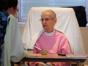 Hannah Flood, 94, speaks with RN Julie Breton, left, May 13, 2013. (NICK BRANCACCIO/The Windsor Star)