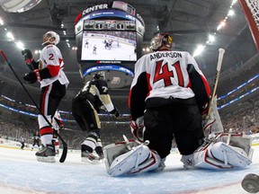 Ottawa goalie Craig Anderson, right, reacts after allowing a goal by Evgeni Malkin of the Penguins in Game 1 of the Eastern Conference semifinals Tuesday. (Photo by Justin K. Aller/Getty Images)