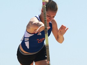 Emily Loebach competes in the pole vault during the WECSSAA track and field championships at Alumni Field in Windsor Wednesday. (TYLER BROWNBRIDGE/The Windsor Star)