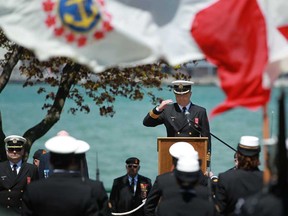 Cmdr. Dan Manu-Popa, centre, commanding officer of HMCS Hunter, speaks at the annual Battle of the Atlantic Commemoration Service at Dieppe Park, Sunday, May 5, 2013. A privately funded $350,000 proposal seeks to install an 18-storey flagpole and huge Maple Leaf flag in Dieppe Gardens. (DAX MELMER/The Windsor Star)