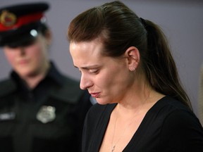 Sharlene Bosma, the wife of a man who was killed after posting his truck for sale online, addresses a news conference in Ancaster, Ont., Wednesday, May 15, 2013. Hamilton police believe 32-year-old Tim Bosma was killed May 6, some time after leaving his house on the test drive, and his body was found this week, burned beyond recognition.THE CANADIAN PRESS/Dave Chidley