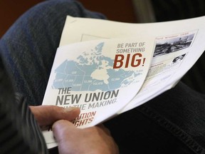 In this file photo, members of the CAW and CEP attend a general information meeting Monday, May 6, 2013, at the CAW local 444 Hall in Windsor, Ont. regarding a merger  of the two unions. (DAN JANISSE/The Windsor Star)