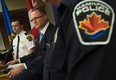 Det.Sgt Matt Matt Kavanagh, centre, discusses the Timothy Bosma missing man case at a news conference in Hamilton, Ont., Tuesday, May 14, 2013. A massive search for Bosma, a southern Ontario man who vanished more than a week ago, came to a grim conclusion Tuesday when police announced his body had been found.THE CANADIAN PRESS/Nathan Denette