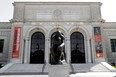 Auguste Rodin's sculpture "The Thinker" is shown outside The Detroit Institute of Arts in Detroit, Tuesday, July 10, 2012. (AP Photo/Paul Sancya)