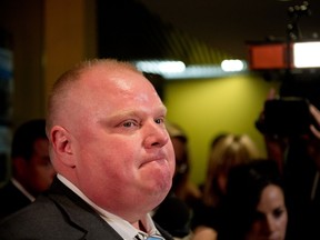 Toronto mayor Rob Ford speaks to the media in front of his office following the resignation of his press secretary and his assistant in Toronto, Ontario, May 27, 2013. He also took a moment to apologize to the media for comments he made on his radio show yesterday referring the the press as 'maggots'. (Tyler Anderson/National Post)