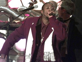 This Feb. 25, 1998 file photo shows O.D.B, Ol' Dirty Bastard of the Wu Tang Clan, whose legal name is Russell Jones, performing at Radio City Music Hall in New York. The culture that in the 1990s lost its brightest stars to gun violence has in recent years seen a series of notable rappers die of drug- and health-related causes. Since 2011, hip-pop pioneer Heavy D, singer and rap chorus specialist Nate Dogg and New York rapper Tim Dog all died of ailments in their 40s. Kriss Kross rapper Chris Kelly was found dead last week in Atlanta of a suspected drug overdose. Jones collapsed and died inside his studio on Nov. 13, 2004. (AP Photo/Mark Lennihan)