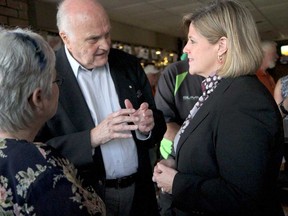 Ontario NDP Leader Andrea Horwath, right, talks with Amherstburg's Coun. Carolyn Davies, left, and former premier of Manitoba Howard Pawley while in Belle River for a consultation visit to talk to local residents about the provincial budget on Saturday, May 4, 2013. (REBECCA WRIGHT/ The Windsor Star)