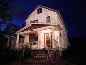 A general view of the exterior of the house where, on Monday, three women who had disappeared as teenagers approximately ten years ago were found alive on May 7, 2013 in Cleveland, Ohio. Amanda Berry, who went missing in 2003, Gina DeJesus, who went missing in 2004, and Michele Knight, who went missing in 2002, were all found alive in the same house. Three suspects, all brothers, have been taken into custody. (Photo by Bill Pugliano/Getty Images)